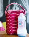 BUILT Bottle Buddy Two Bottle Tote with holder (Baby Pink Mini Dots)