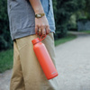Quokka Solid With Strap - Bouteille thermique en acier inoxydable de 630 ml avec sangle (Orange)